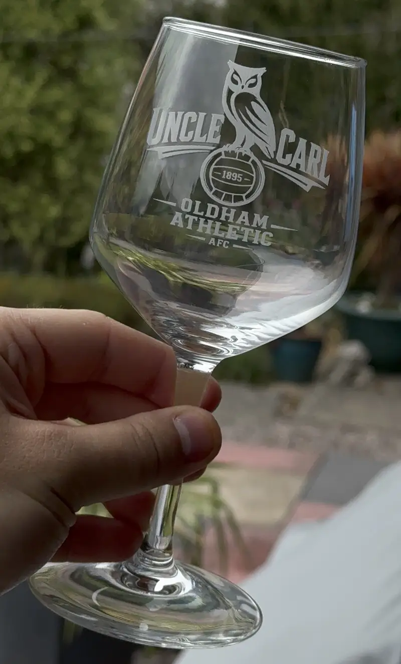 A Silhouette white wine glass with an engraved design